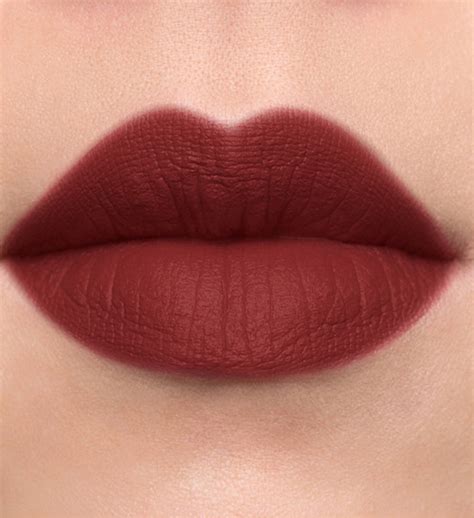 terracotta brown lipstick.